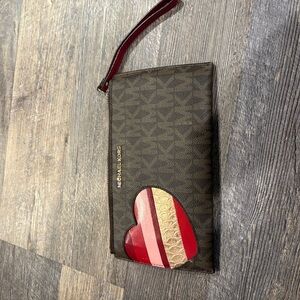 Michael Kors Brown Wristlet with Heart Accent